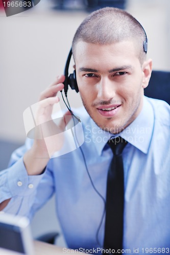Image of businessman with a headset