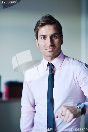 Image of young businessman at office