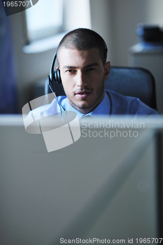 Image of businessman with a headset