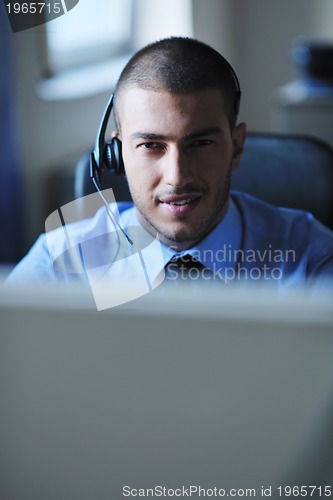 Image of businessman with a headset