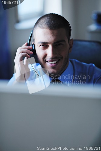 Image of businessman with a headset