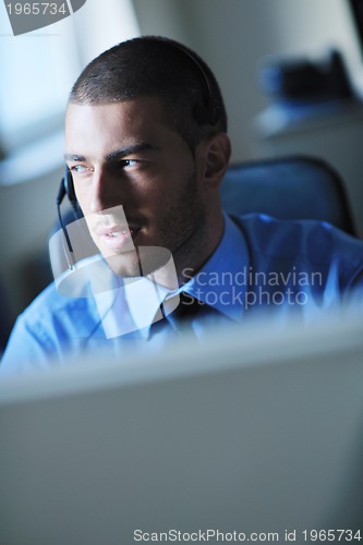 Image of businessman with a headset