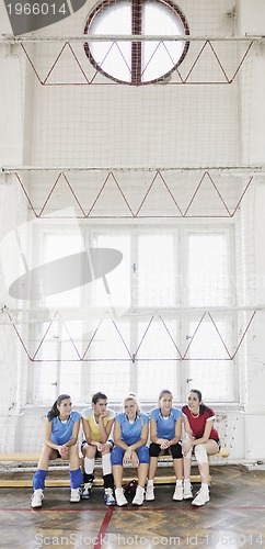 Image of girls playing volleyball indoor game