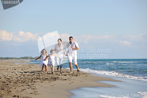 Image of happy young  family have fun on beach