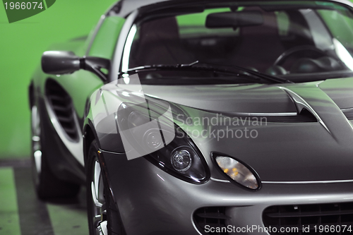 Image of sport car with green background