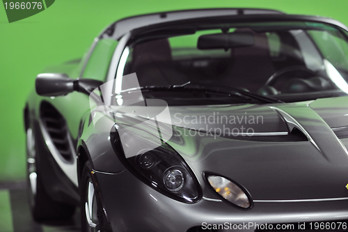 Image of sport car with green background