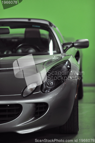 Image of sport car with green background