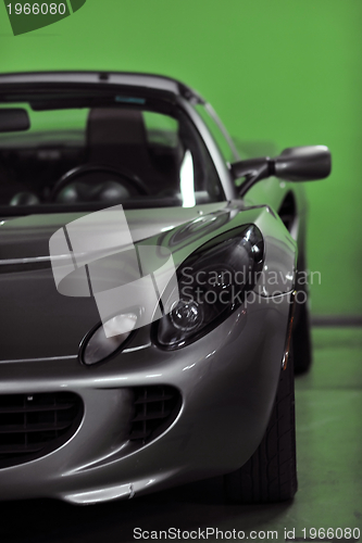 Image of sport car with green background