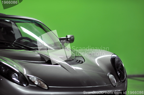 Image of sport car with green background
