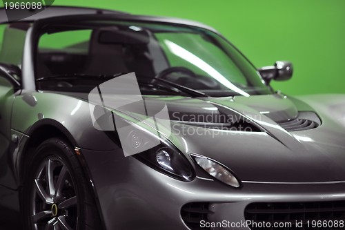 Image of sport car with green background