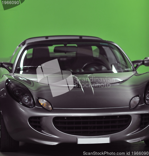 Image of sport car with green background