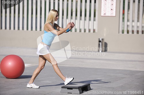 Image of fitness exercise at poolside