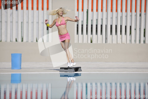 Image of fitness exercise at poolside