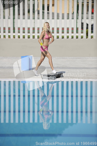 Image of fitness exercise at poolside