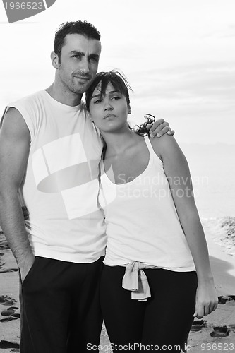 Image of happy young couple have fun at beautiful beach