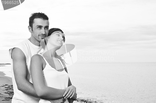 Image of happy young couple have fun at beautiful beach