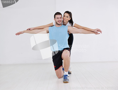 Image of happy young couple fitness workout and fun