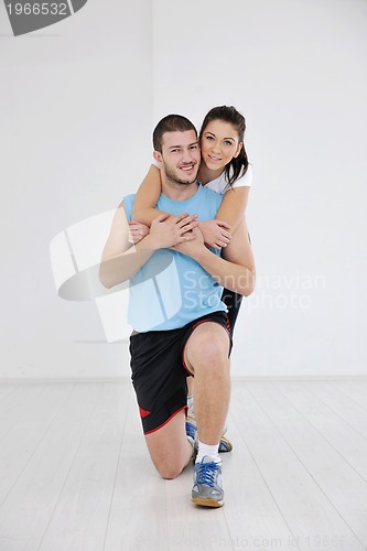 Image of happy young couple fitness workout and fun