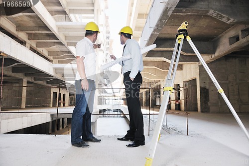 Image of Team of architects on construciton site