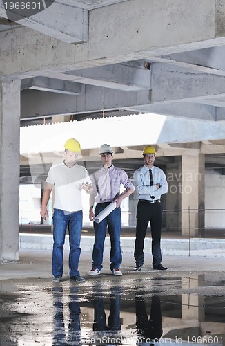 Image of Team of architects on construciton site