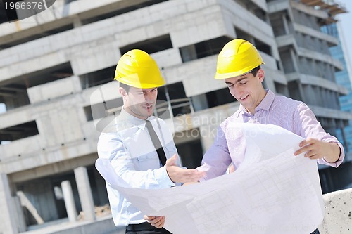 Image of Team of architects on construciton site