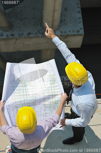 Image of Team of architects on construciton site