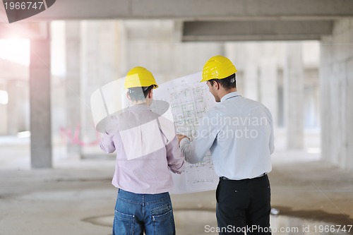 Image of Team of architects on construciton site