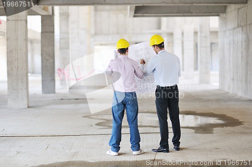 Image of Team of architects on construciton site