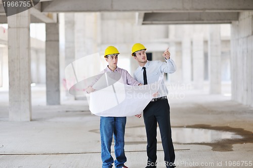 Image of Team of architects on construciton site