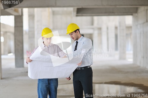 Image of Team of architects on construciton site