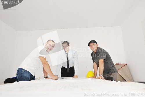 Image of Team of architects on construciton site