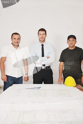 Image of Team of architects on construciton site