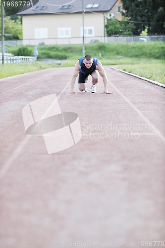 Image of young athlete on start