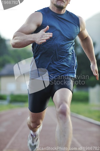 Image of young athlete running