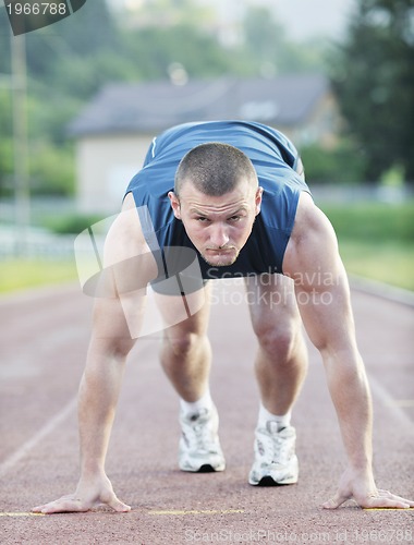 Image of young athlete on start