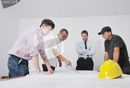 Image of Team of architects on construciton site