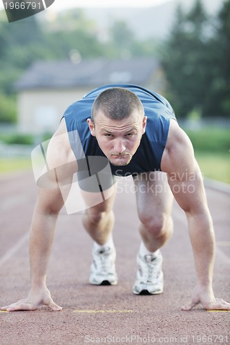 Image of young athlete on start