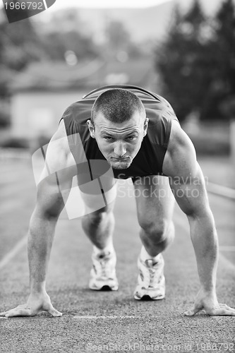 Image of young athlete on start 