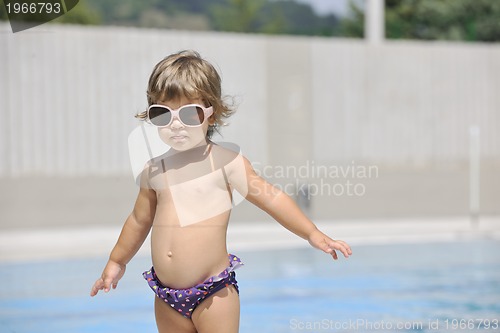 Image of beautiful woman relax on swimming pool