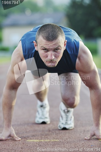 Image of young athlete on start 