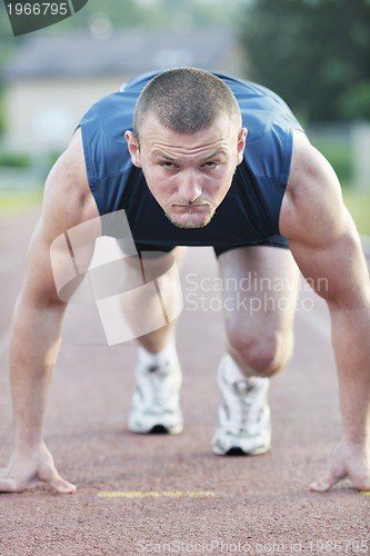 Image of young athlete on start