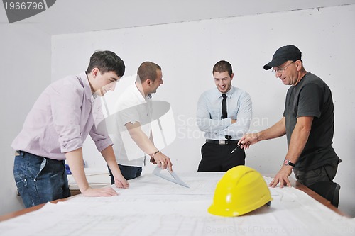 Image of Team of architects on construciton site