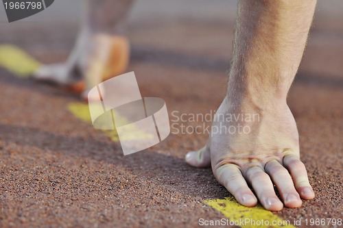 Image of young athlete on start 