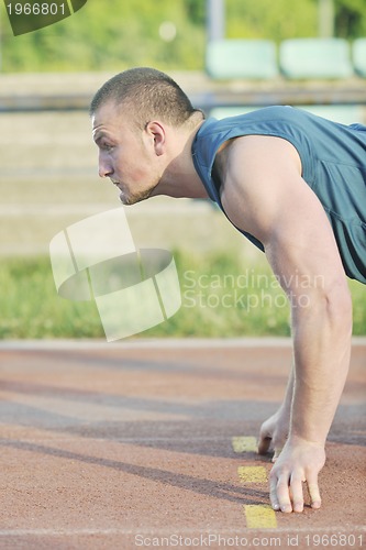 Image of young athlete on start