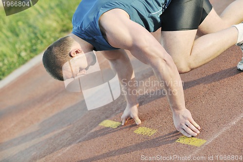 Image of young athlete on start