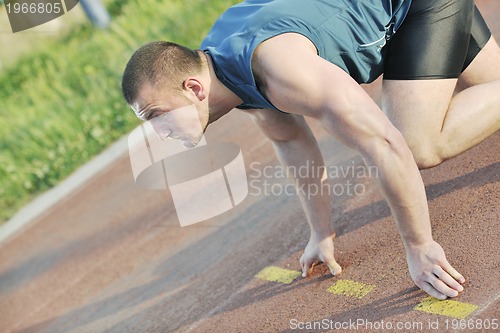 Image of young athlete on start