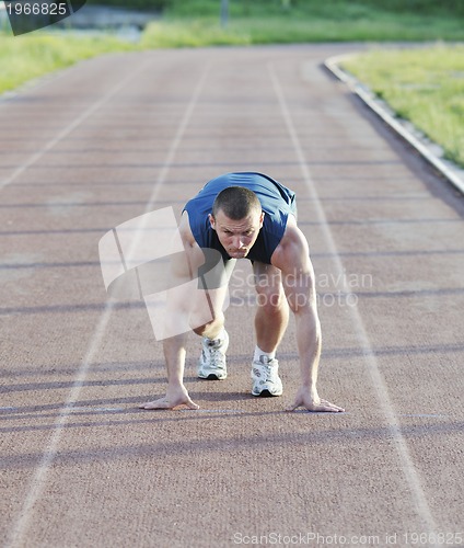 Image of young athlete on start 