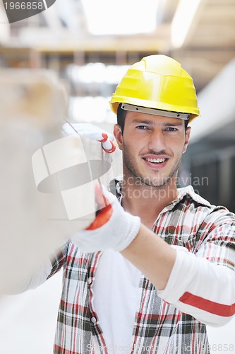 Image of hard worker on construction site