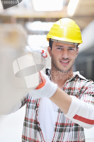 Image of hard worker on construction site