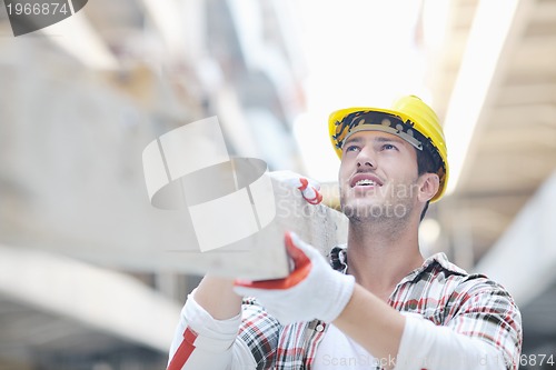 Image of hard worker on construction site